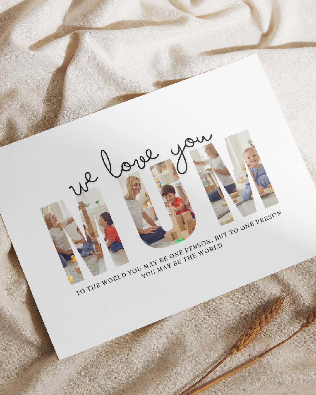 Card with 'we love you' and family photos on a beige fabric background